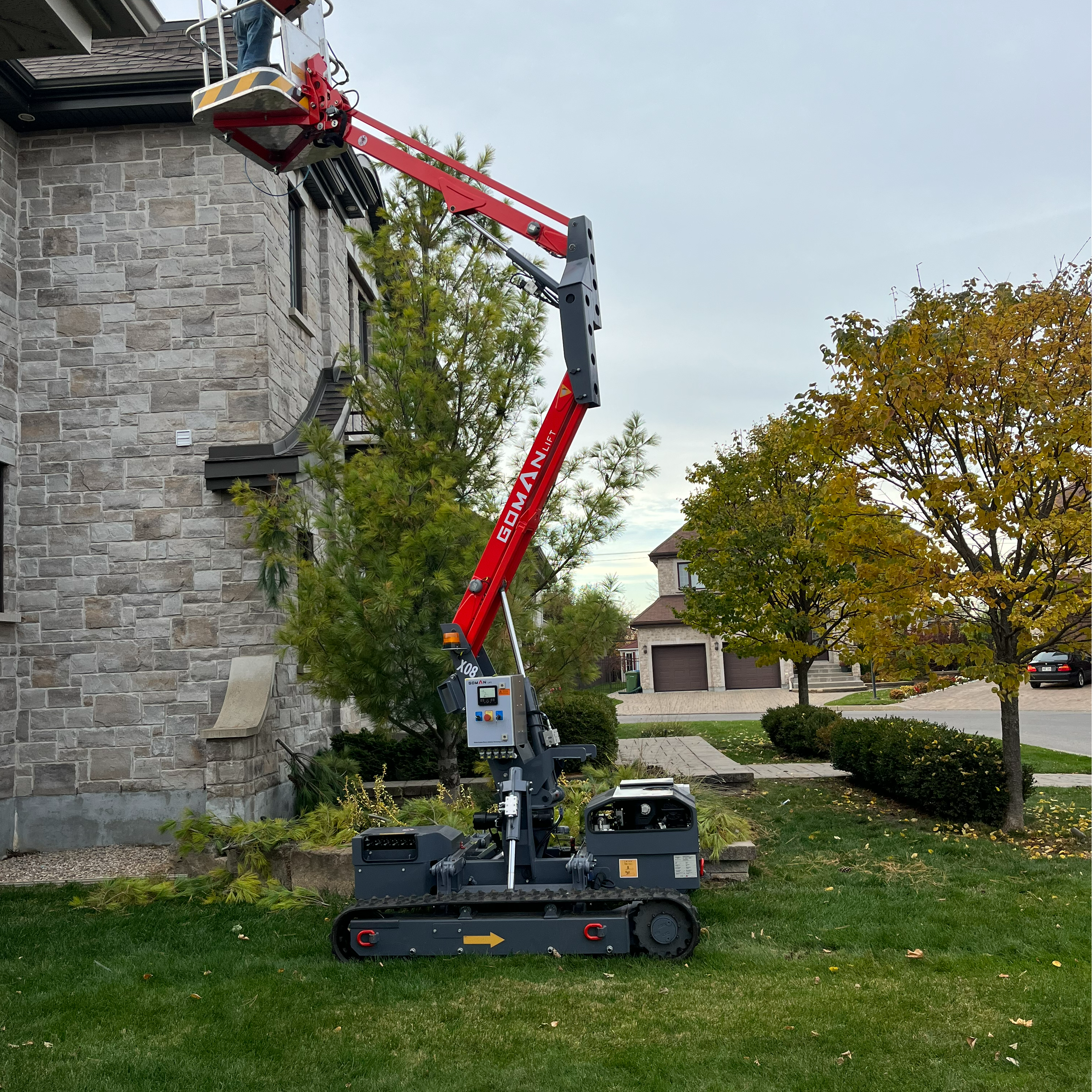 Crawler Boom Lift navigating a narrow indoor space