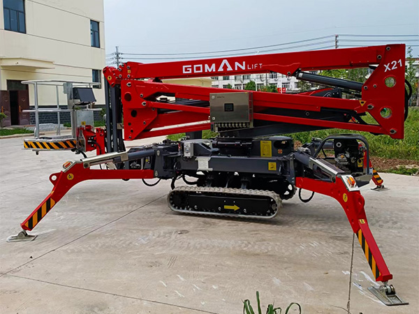 Versatile spider lift operating on uneven terrain